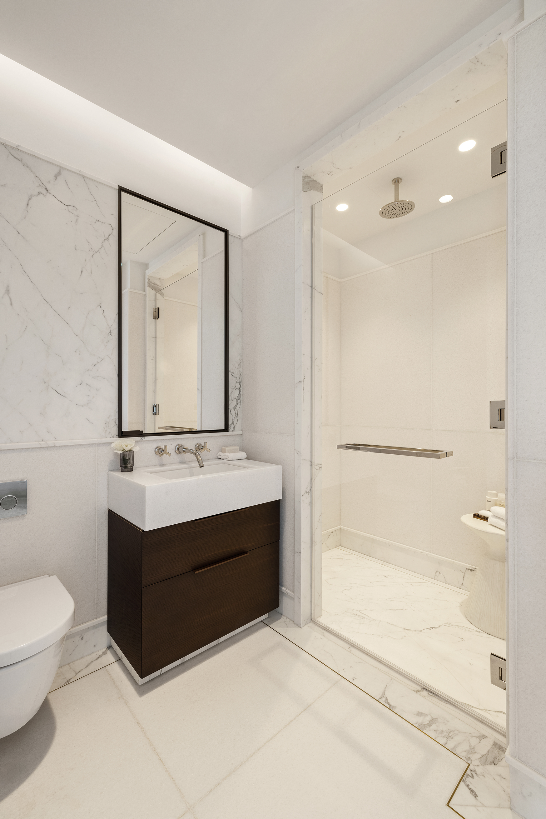 500 West 18th Street, Unit EAST 15G Manhattan, NY 10011 - Photo 11 of 26 a bathroom with a sink a toilet and shower