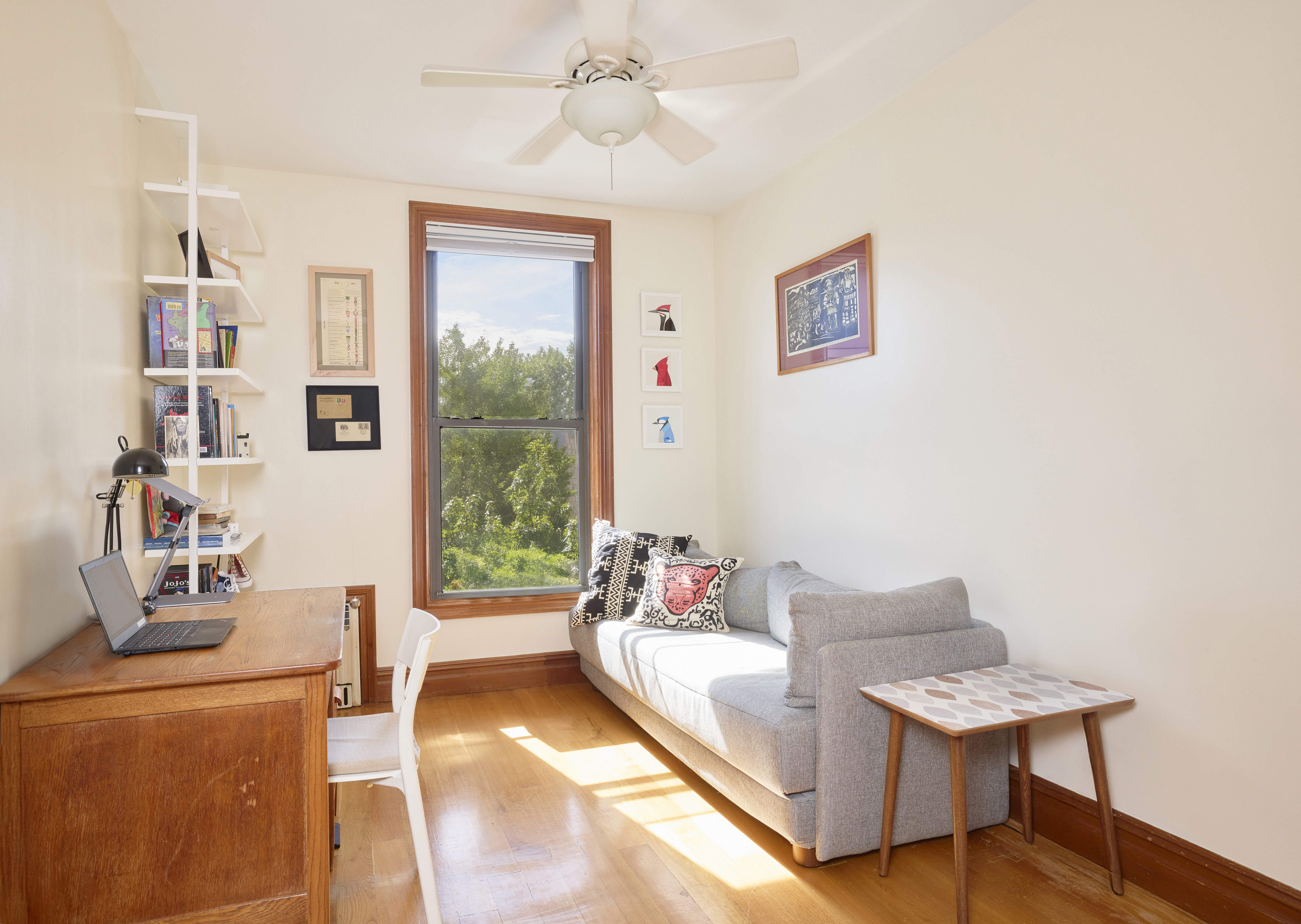 1702 8th Avenue, Unit 3 Brooklyn, NY 11215 - Photo 8 of 15 a living room with furniture and a window