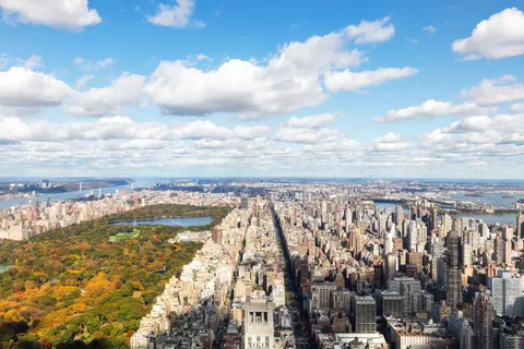 a view of a lake with a city