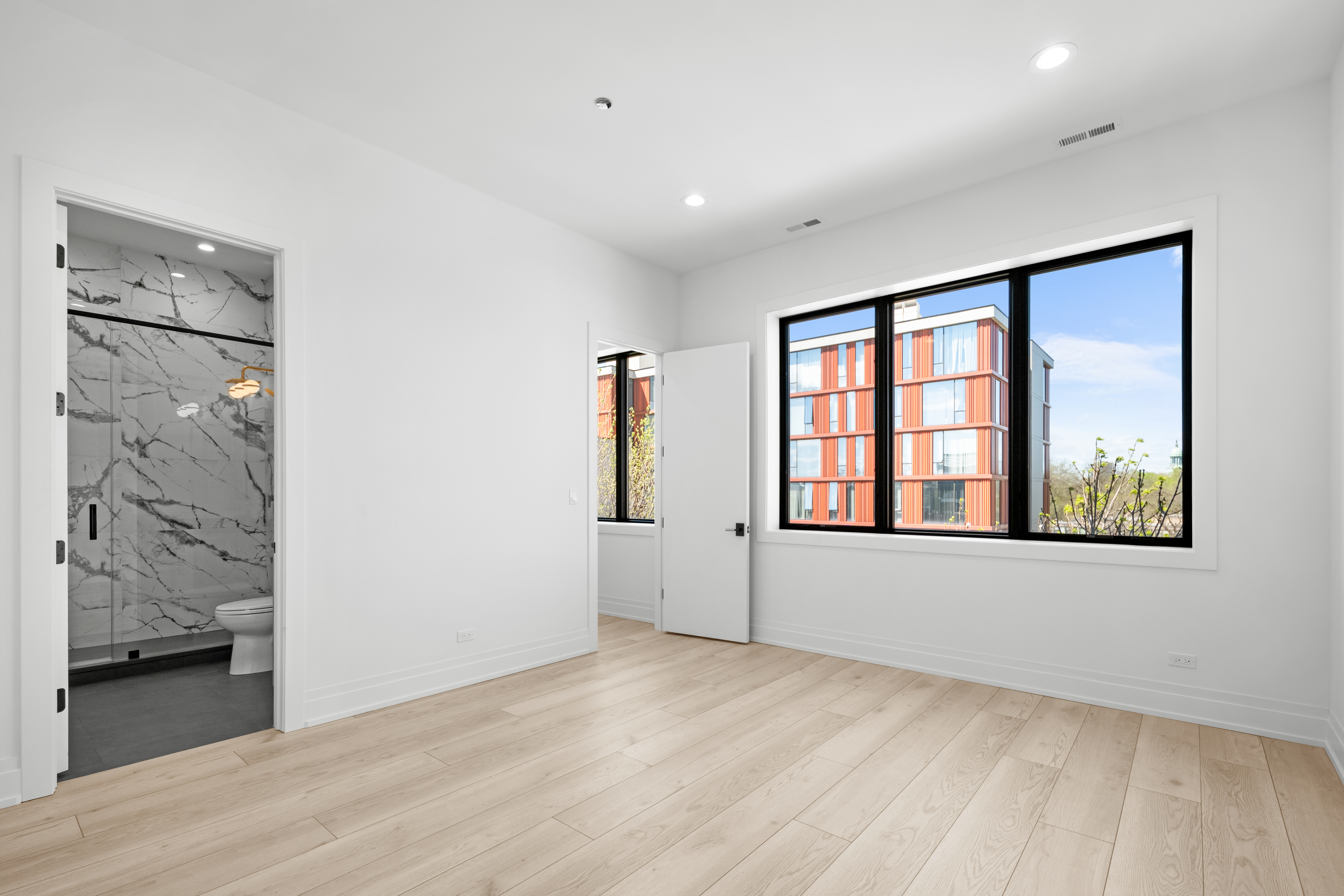 1327 West Taylor Street, Unit 4 Chicago, IL 60607 - Photo 20 of 27 a view of an empty room with a window
