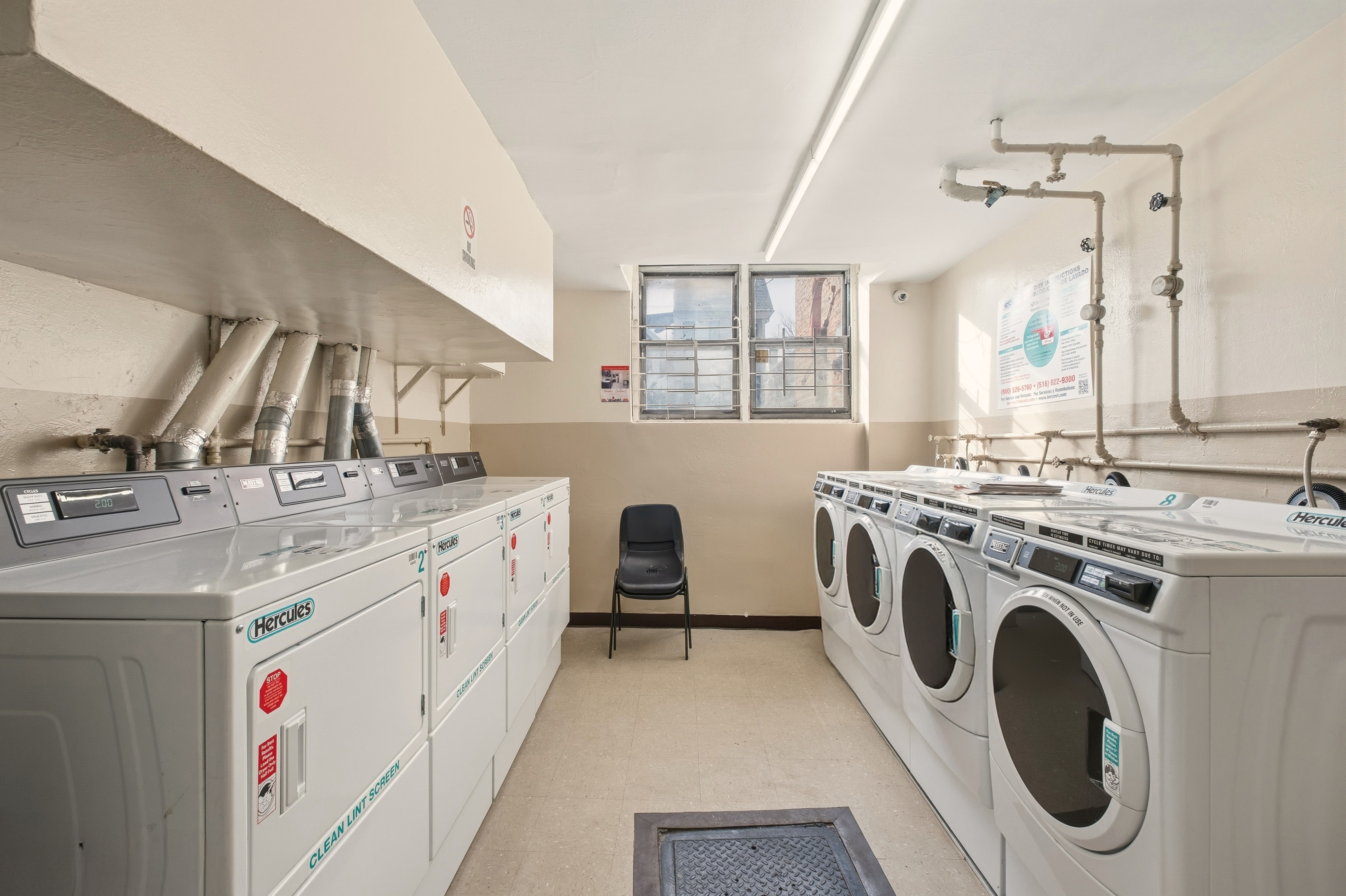 1577 East 17th Street, Unit 2F Brooklyn, NY 11230 - Photo 17 of 21 a utility room with sink dryer and washer