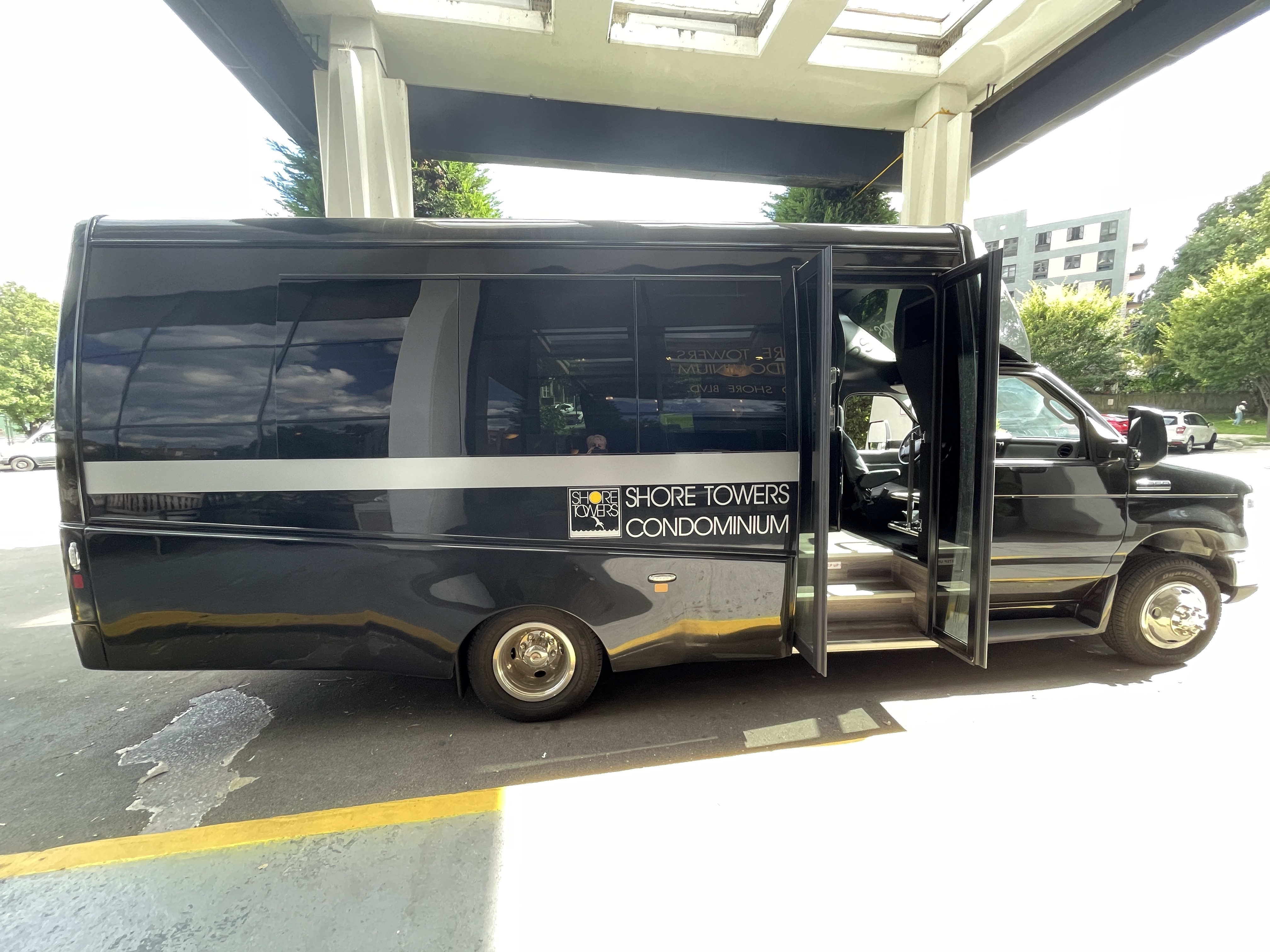 25-40 Shore Boulevard, Unit 15S Queens, NY 11102 - Photo 18 of 21 a car parked in front of building