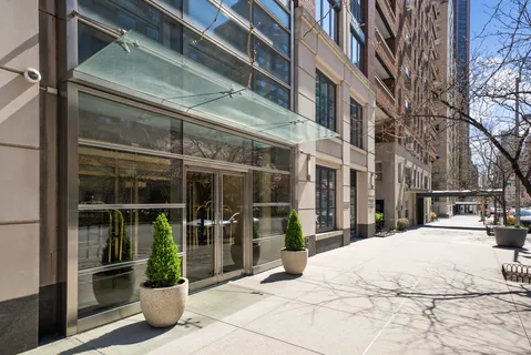 a view of a building with a potted plant