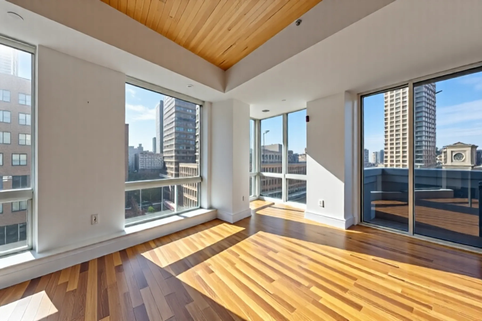 150 Myrtle Avenue, Unit 803 Brooklyn, NY 11201 - Photo 2 of 29 a view of a bedroom with wooden floor and windows
