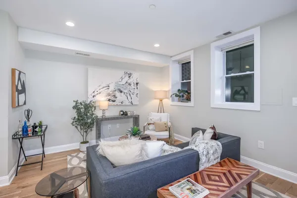 a living room with furniture and window