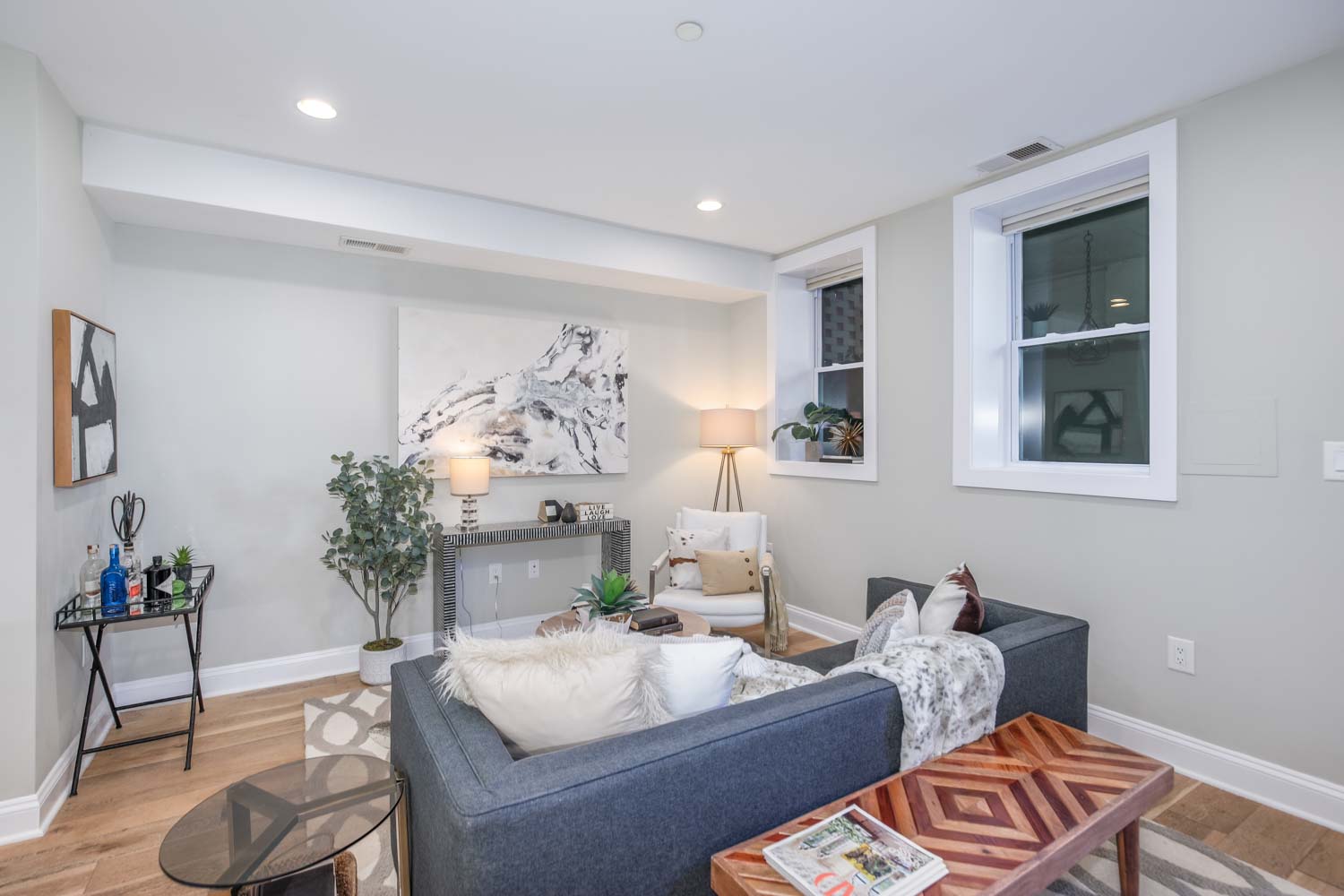 3123 Warder Street Northwest, Unit 1 Washington, DC 20010 - Photo 6 of 24 a living room with furniture and window