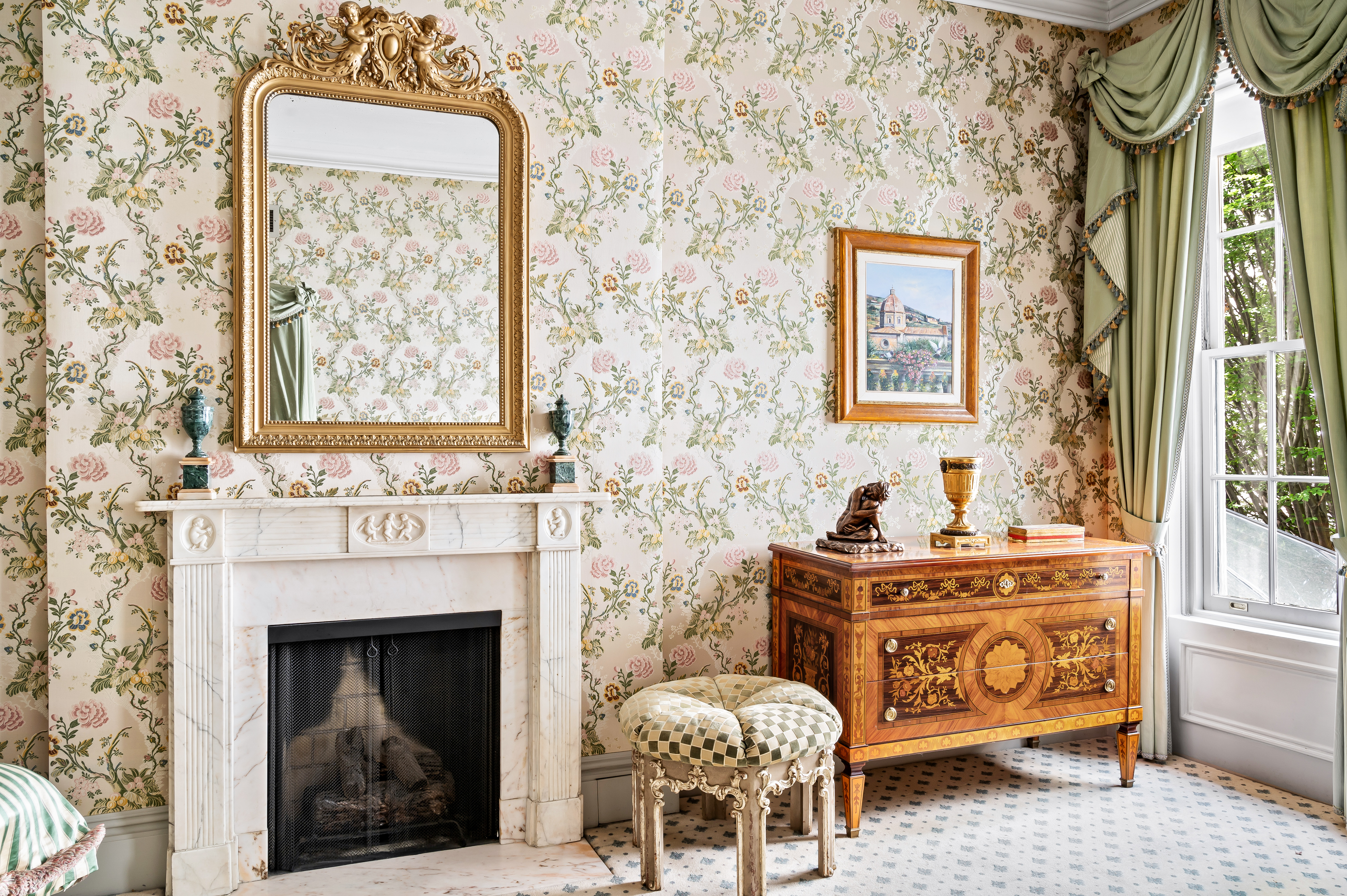 163 East 64th Street Manhattan, NY 10065 - Photo 21 of 34 a living room with furniture and a fireplace