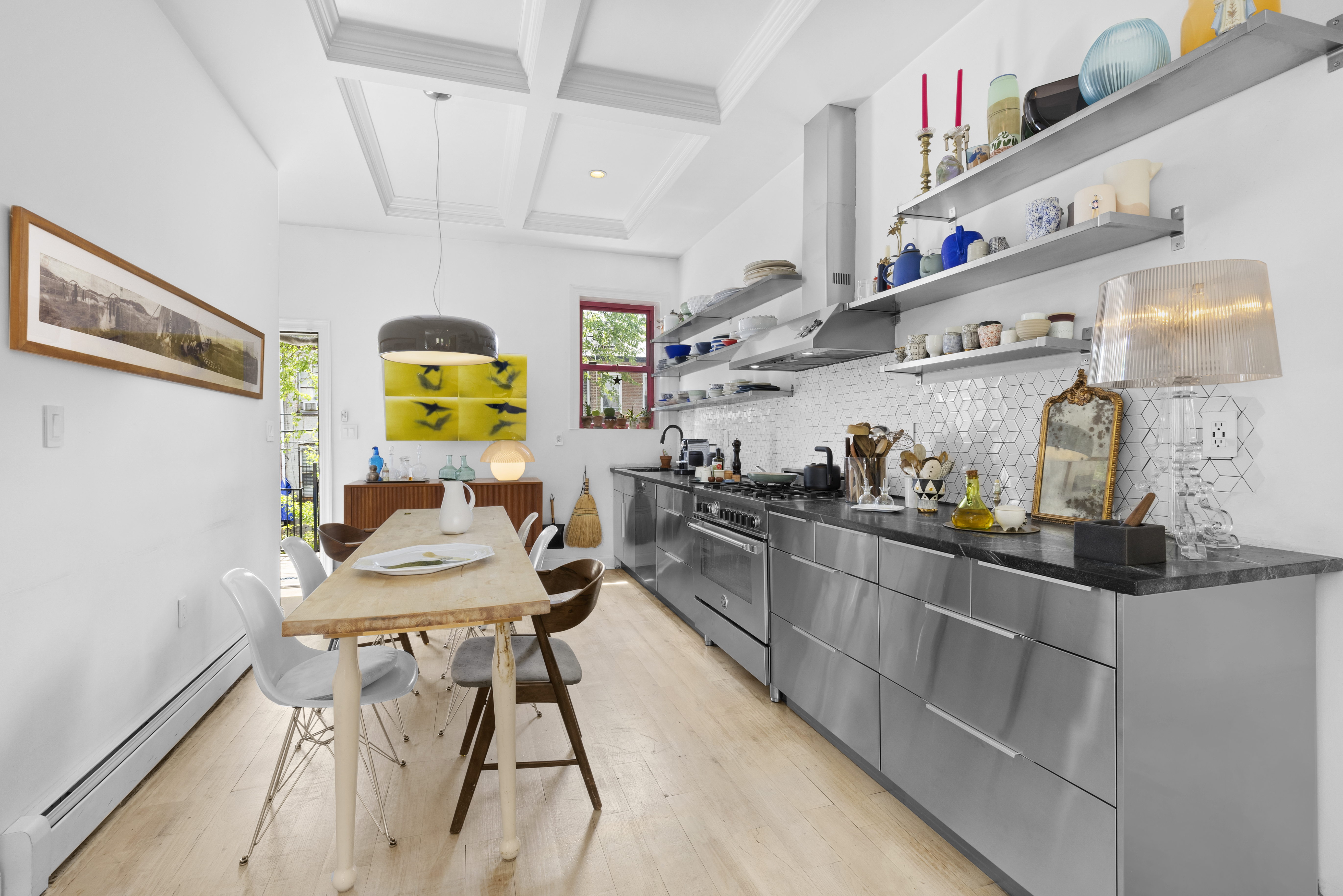 778 Hancock Street, Unit 2 Brooklyn, NY 11233 - Photo 3 of 11 a kitchen with stainless steel appliances granite countertop a sink and cabinets