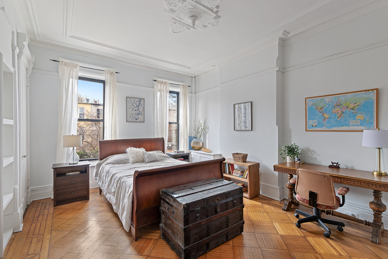 156 Bainbridge Street Brooklyn, NY 11233 - Photo 2 of 14 a bed room with a bed and a desk