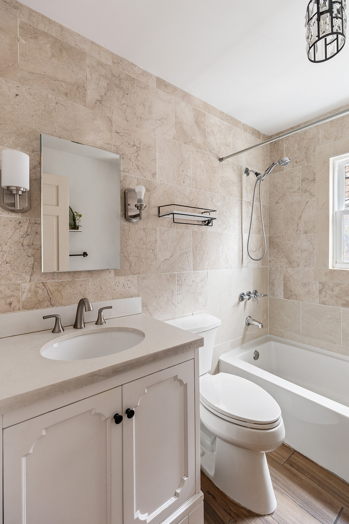 267 Marlborough Road Brooklyn, NY 11226 - Photo 11 of 14 a bathroom with a sink a toilet and a bathtub