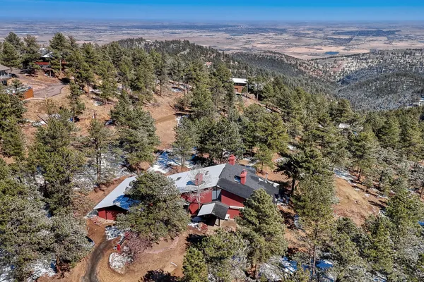 a view of a room with large windows