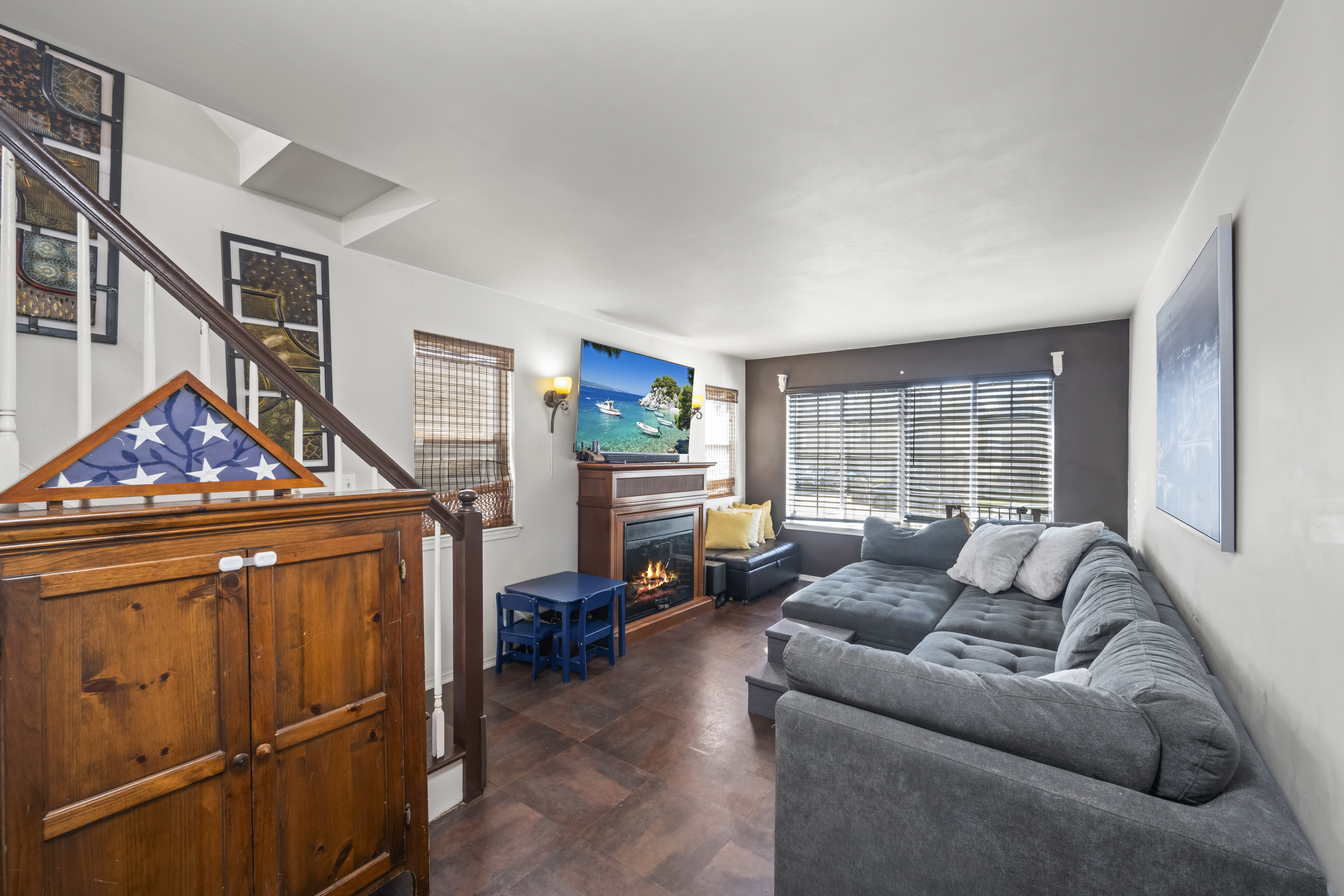 55 Sideview Avenue Staten Island, NY 10314 - Photo 4 of 28 a living room with furniture and a flat screen tv