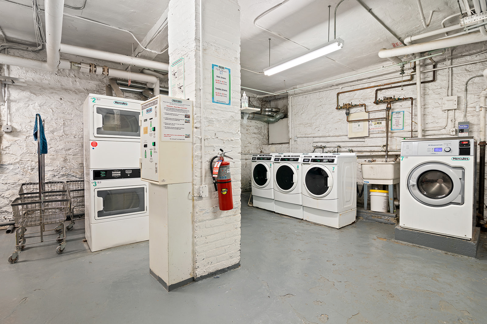 660 Riverside Drive, Unit 4D Manhattan, NY 10031 - Photo 5 of 6 a utility room with dryer and washer