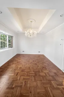 a view of empty room with windows