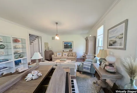 a kitchen with a stove and a wooden floor
