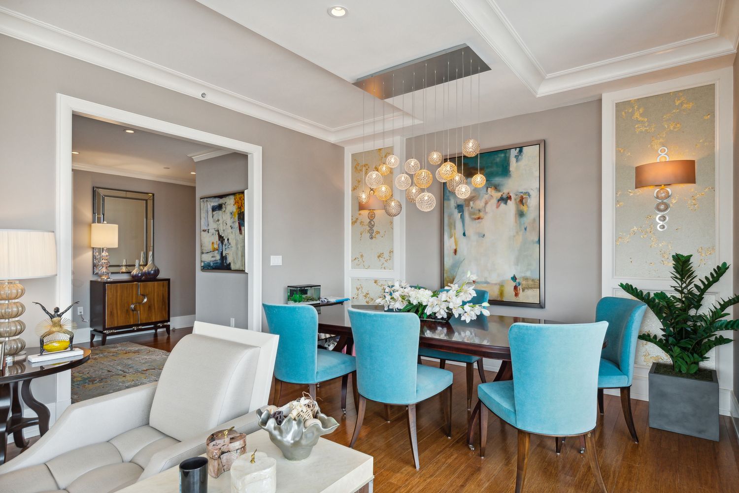 255 East 74th Street, Unit 20C Manhattan, NY 10021 - Photo 5 of 16 a view of a dining room with furniture and wooden floor
