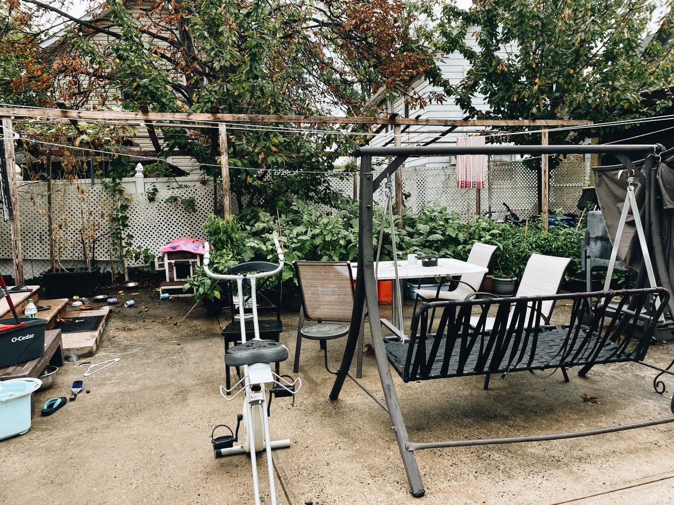 a view of outdoor dining space with a table and chairs