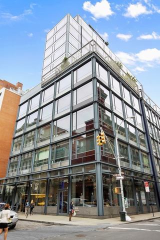 40 Mercer Street, Unit 19 Manhattan, NY 10013 - Photo 11 of 16 a view of a building and a street