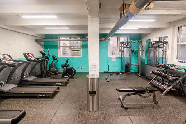 143 Bennett Avenue, Unit 6R Manhattan, NY 10040 - Photo 17 of 22 a room with gym equipment and a large window
