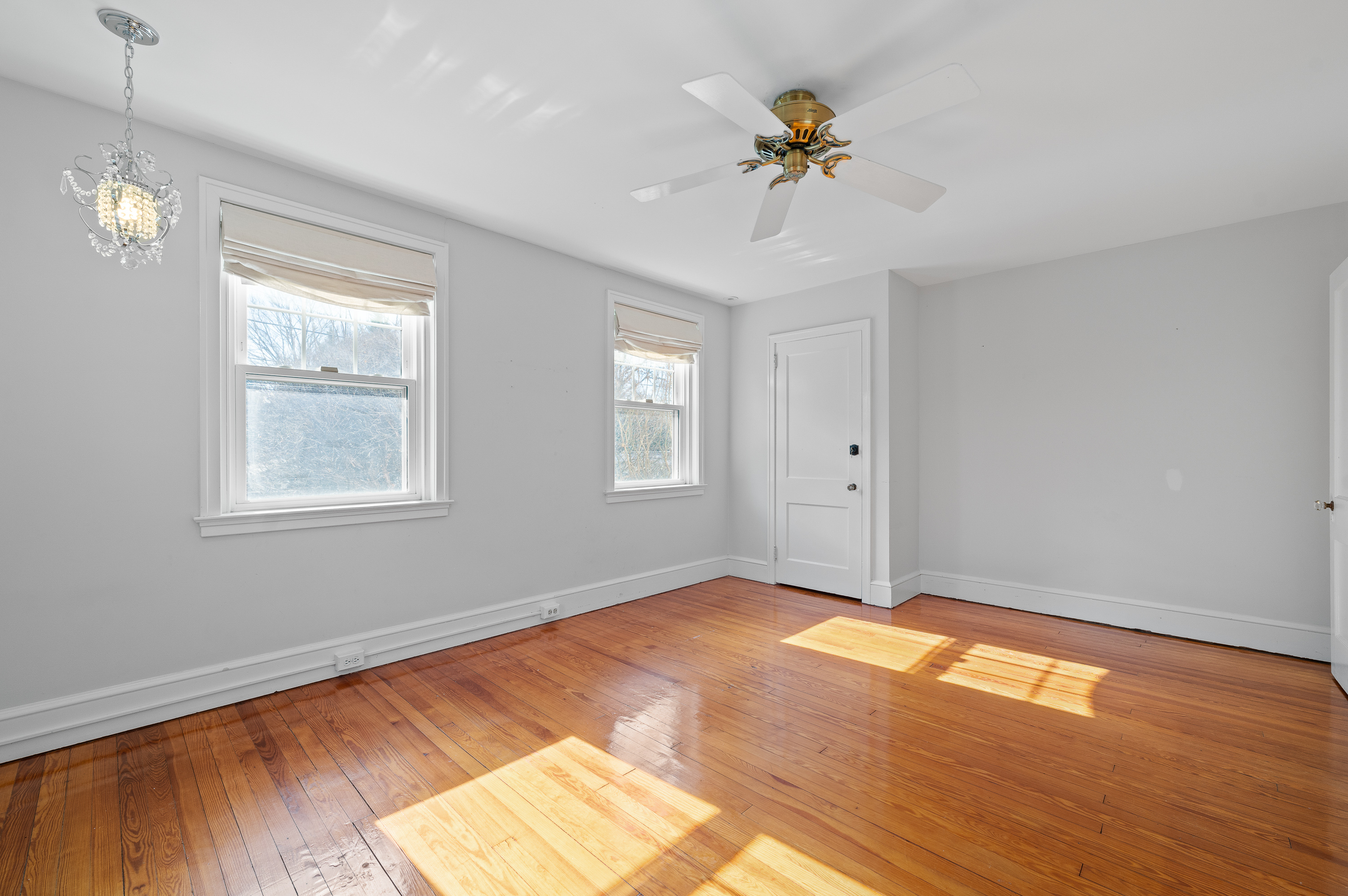 201 West Avenue Wayne, PA 19087 - Photo 16 of 26 a view of an empty room with wooden floor and a window