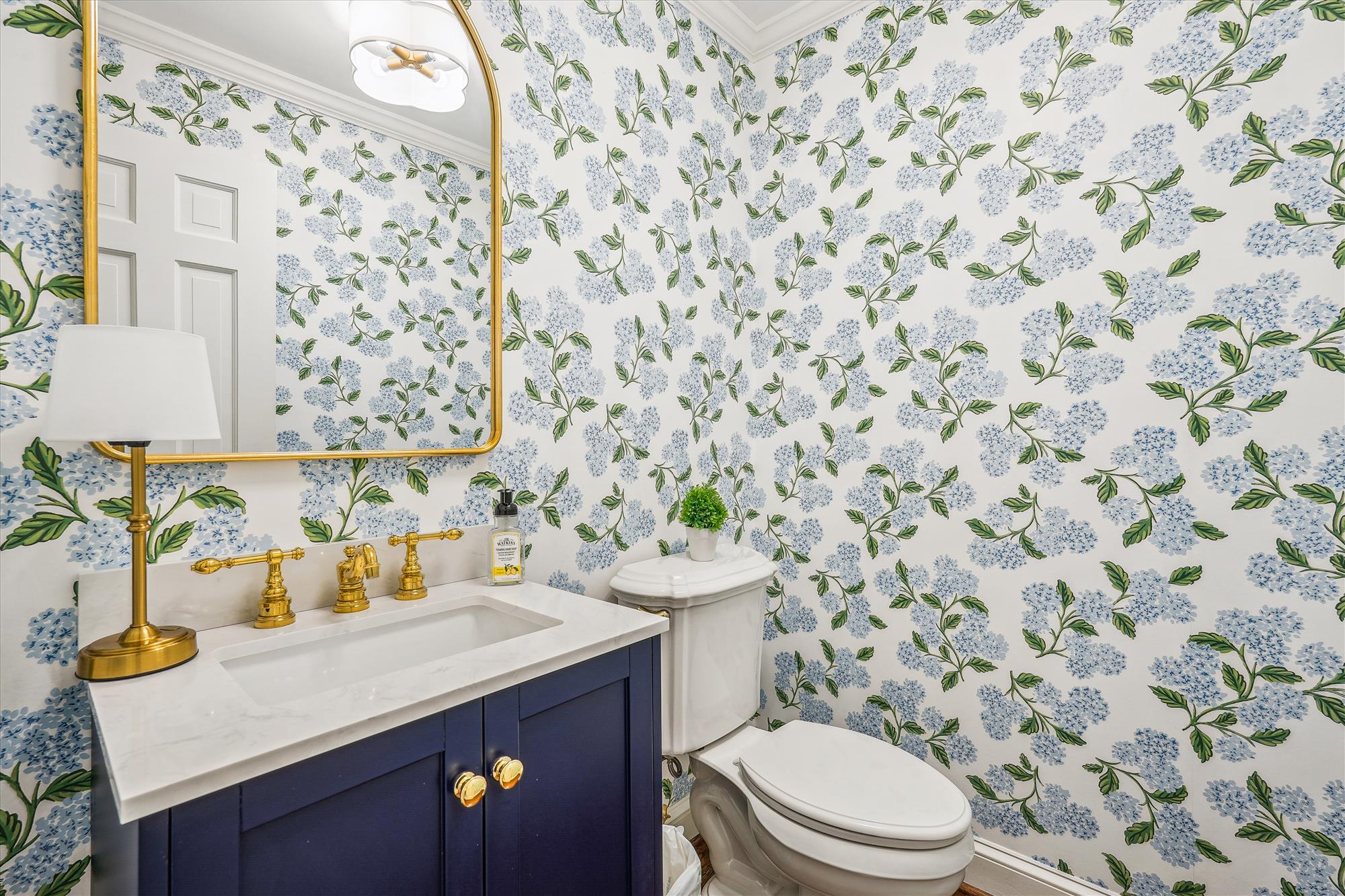 9904 Carter Road Bethesda, MD 20817 - Photo 19 of 41 a bathroom with a sink toilet and mirror