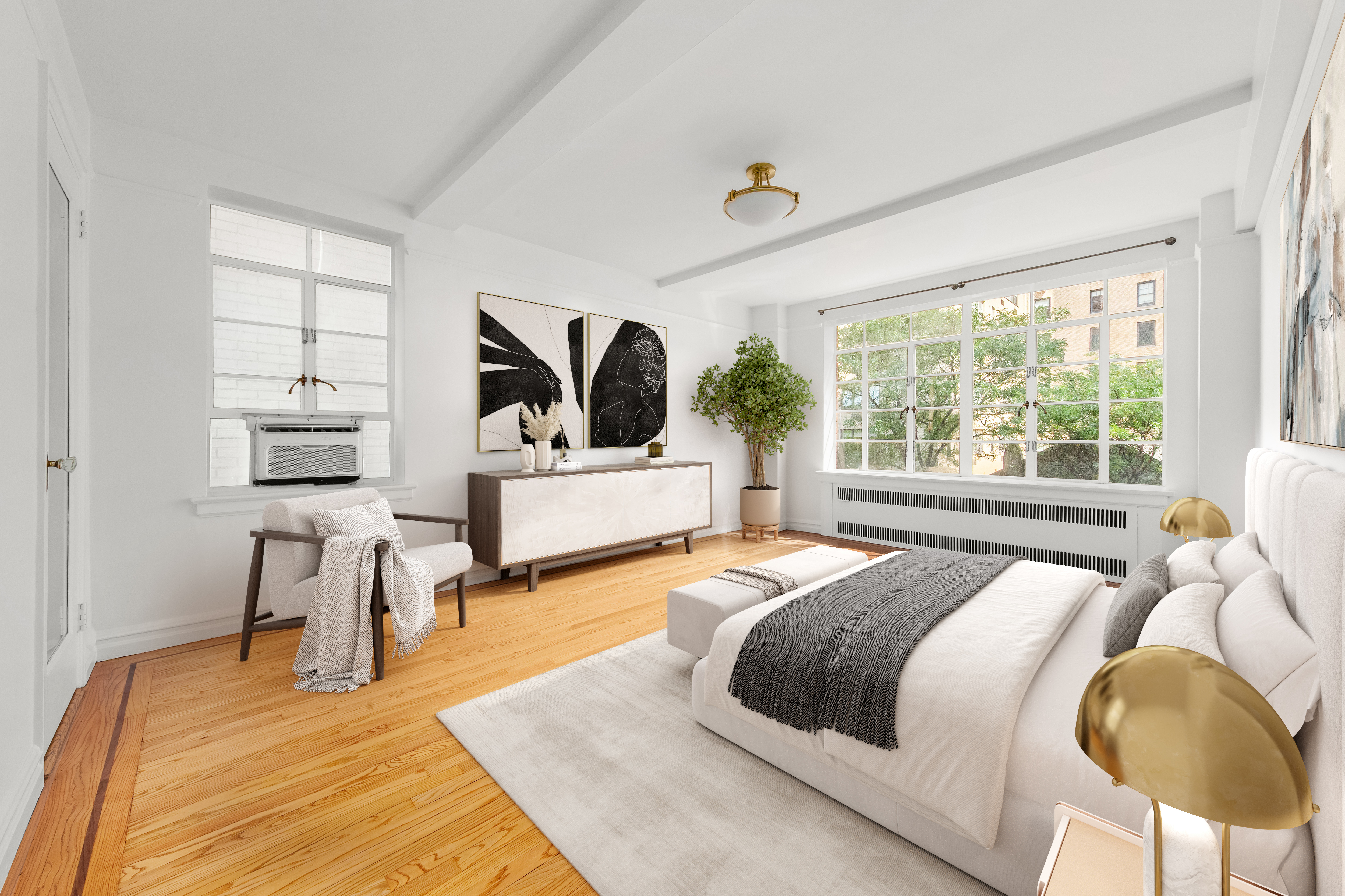 110 East 87th Street, Unit 5C Manhattan, NY 10128 - Photo 8 of 13 a spacious bedroom with a bed and a large window