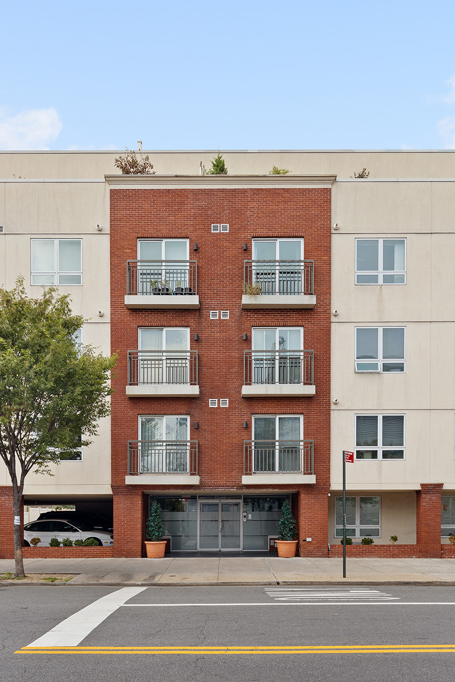63-34 Fresh Pond Road, Unit 3D Queens, NY 11385 - Photo 12 of 14 a view of a building with a street