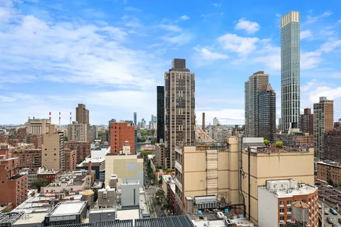 a view of a city with tall buildings