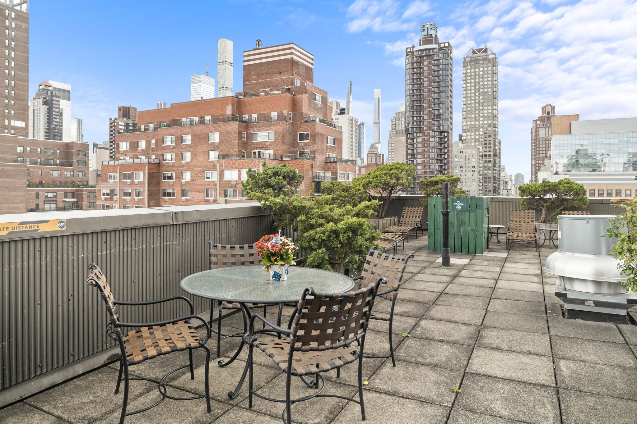 401 East 65th Street, Unit 12F Manhattan, NY 10065 - Photo 13 of 18 a view of a terrace with sitting area