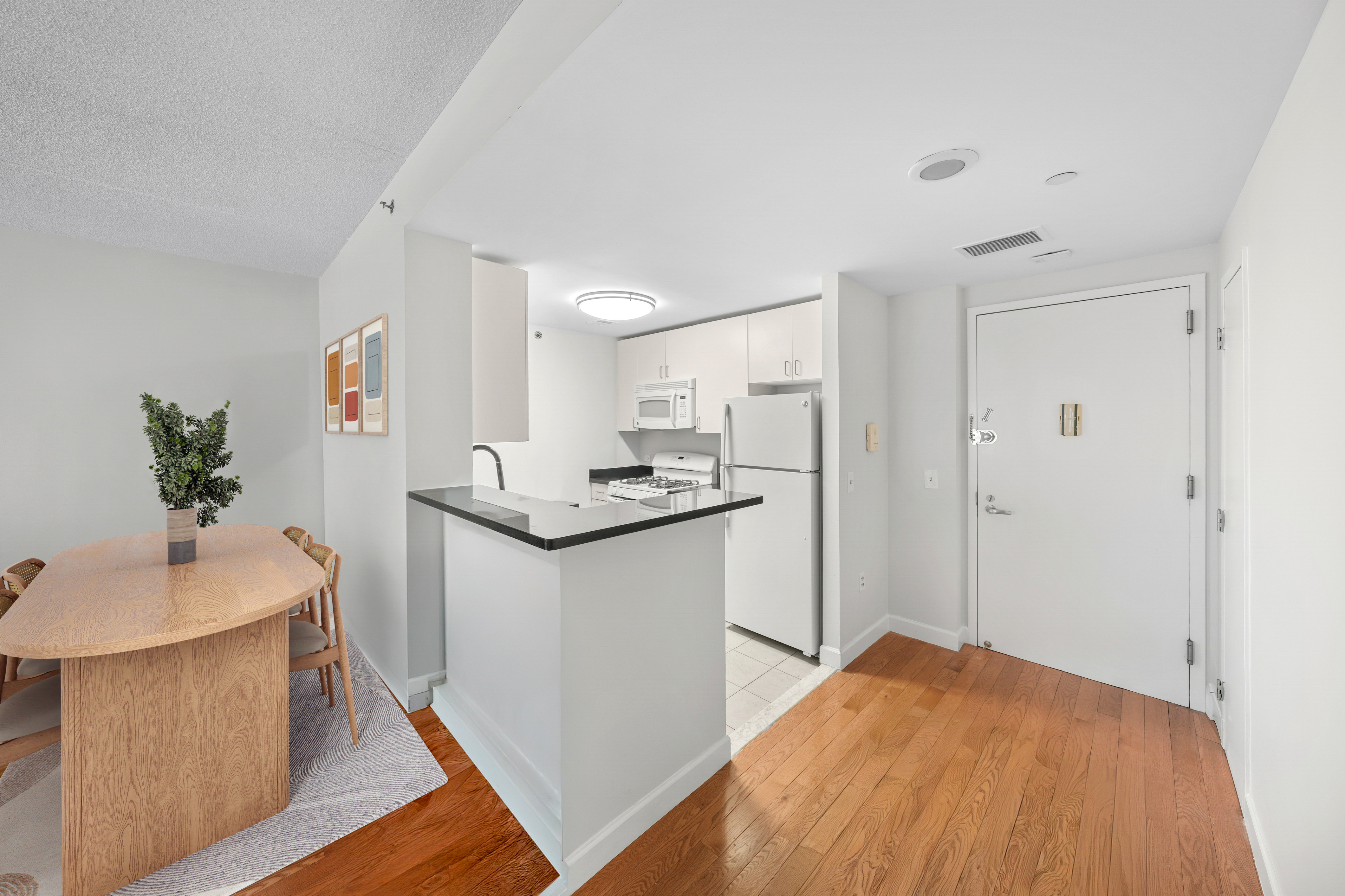 40 West 116th Street, Unit B301 Manhattan, NY 10026 - Photo 5 of 17 a bathroom with a sink and a mirror