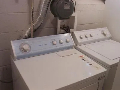a utility room with dryer and washer