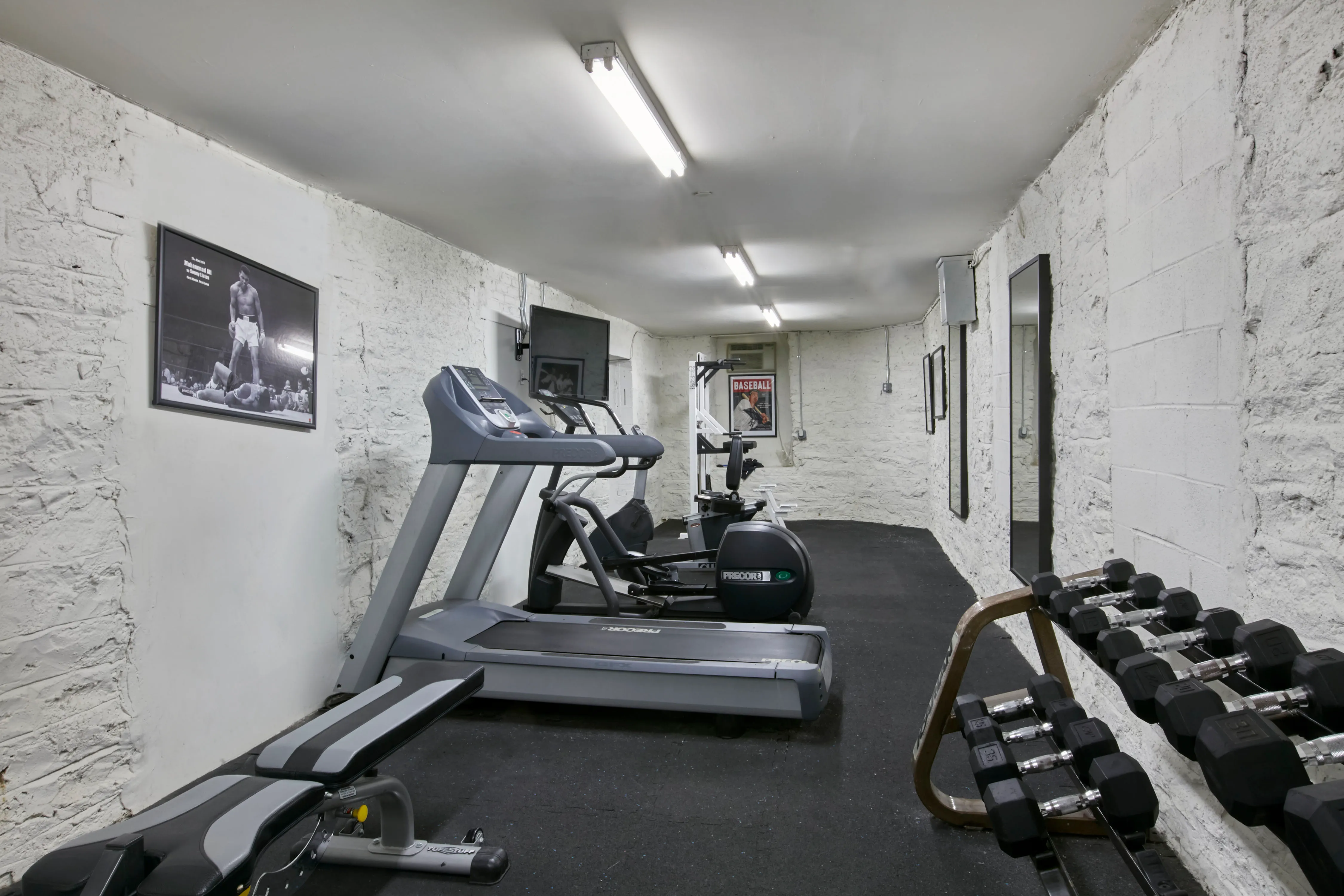 305 West 150th Street, Unit 206 Manhattan, NY 10039 - Photo 11 of 18 a room with gym equipment