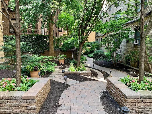434 East 52nd Street, Unit 1BH Manhattan, NY 10022 - Photo 21 of 23 a view of a backyard with sitting area