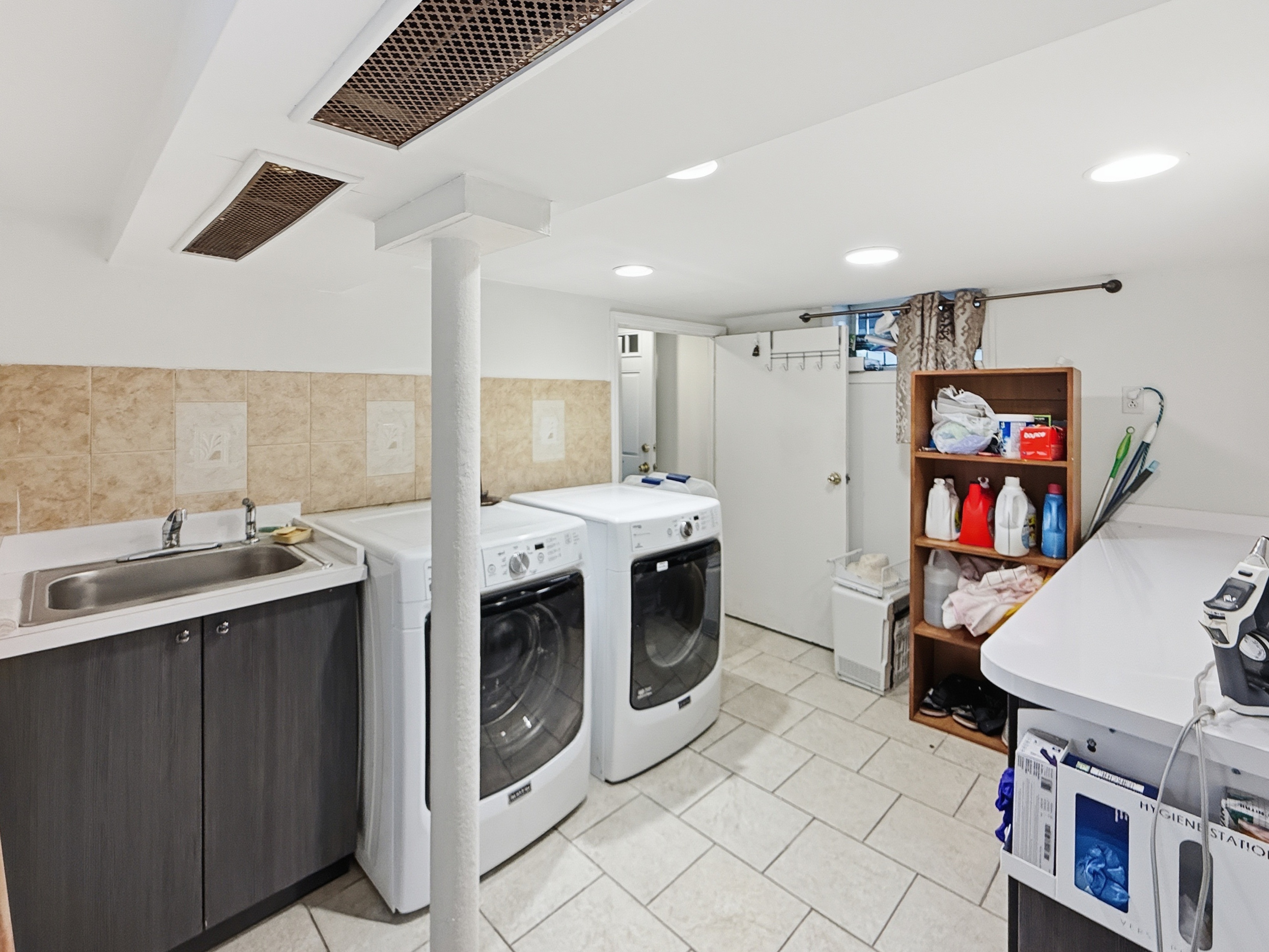 3735 Oceanic Avenue Brooklyn, NY 11224 - Photo 21 of 26 a kitchen with stainless steel appliances granite countertop a stove and a sink