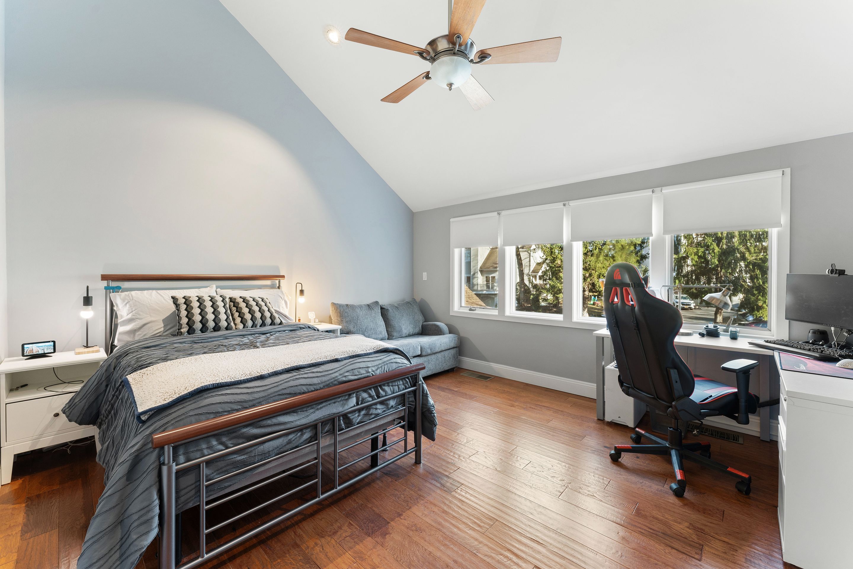 124 Boulder Ridge Road Scarsdale, NY 10583 - Photo 15 of 31 a bedroom with a bed chair and a window