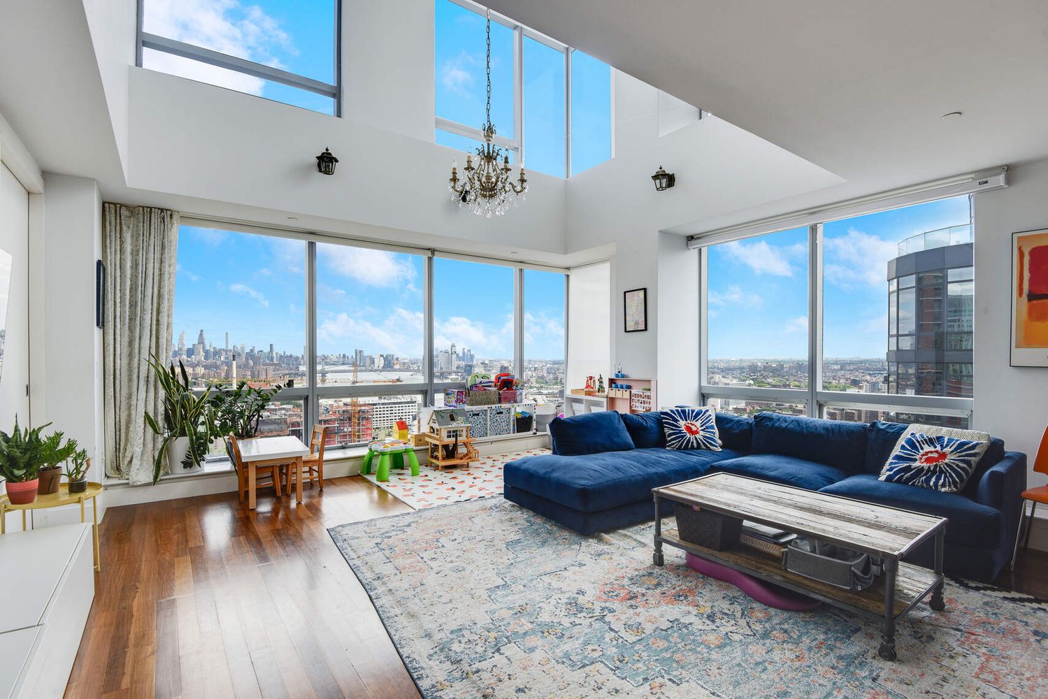 150 Myrtle Avenue, Unit PH3201 Brooklyn, NY 11201 - Photo 5 of 40 a living room with furniture and a large window