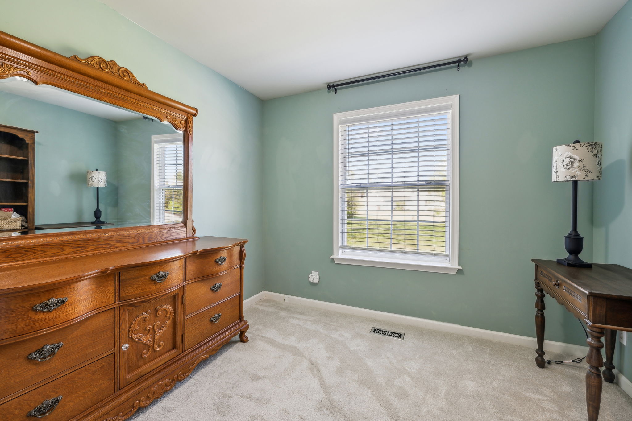 405 Billy Lane Spring Hill, TN 37174 - Photo 23 of 39 a spacious bathroom with a granite countertop sink a mirror and a window