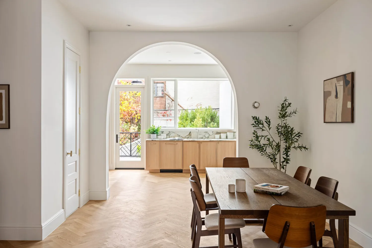a view of a dining room with furniture window and outside view