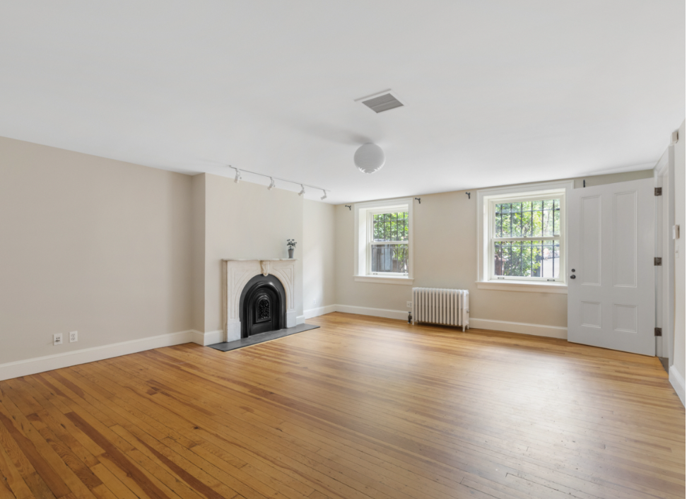 128 State Street, Unit GARDEN Brooklyn, NY 11201 - Photo 5 of 10 a view of empty room with window and fireplace
