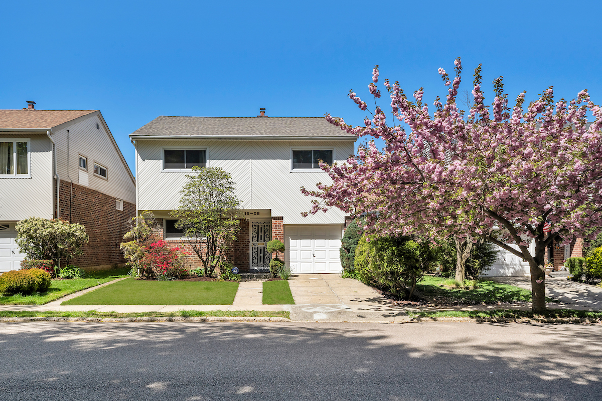 16-08 202nd Street Queens, NY 11360 - Photo 1 of 13 a house view with a sitting space