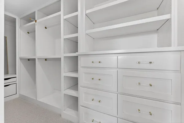 a view of an empty walk in closet