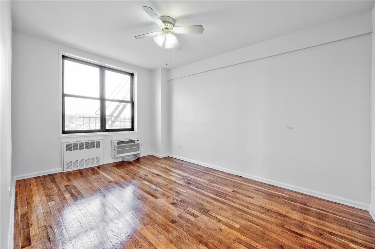 1270 East 51st Street, Unit 6X Brooklyn, NY 11234 - Photo 12 of 17 a view of an empty room with a window