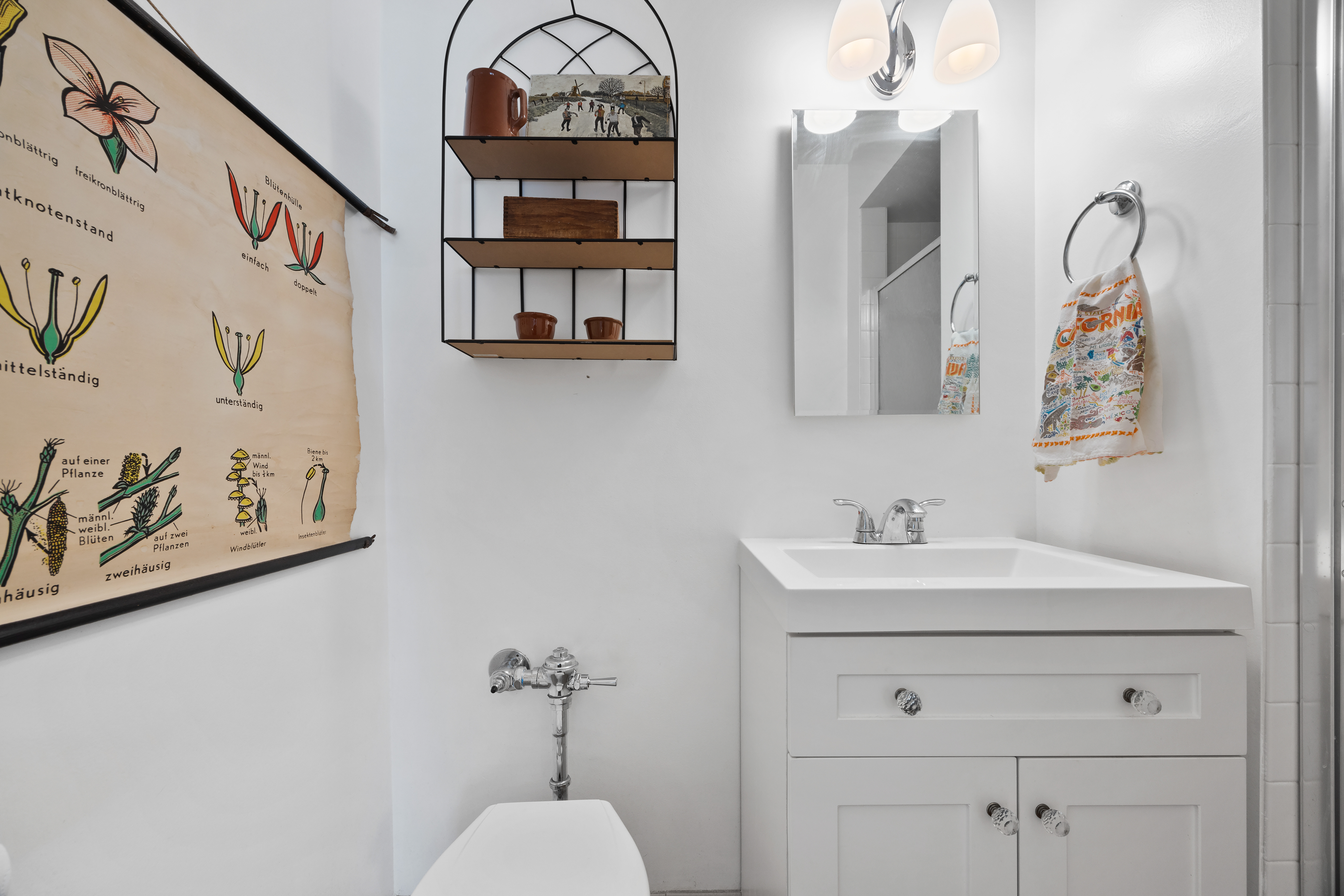 255 Fieldston Terrace, Unit 2L Bronx, NY 10471 - Photo 22 of 32 a bathroom with a sink and a mirror