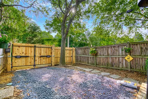 a outdoor living space with patio furniture and a umbrella