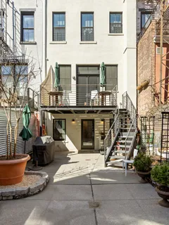 a view of a building with sitting area