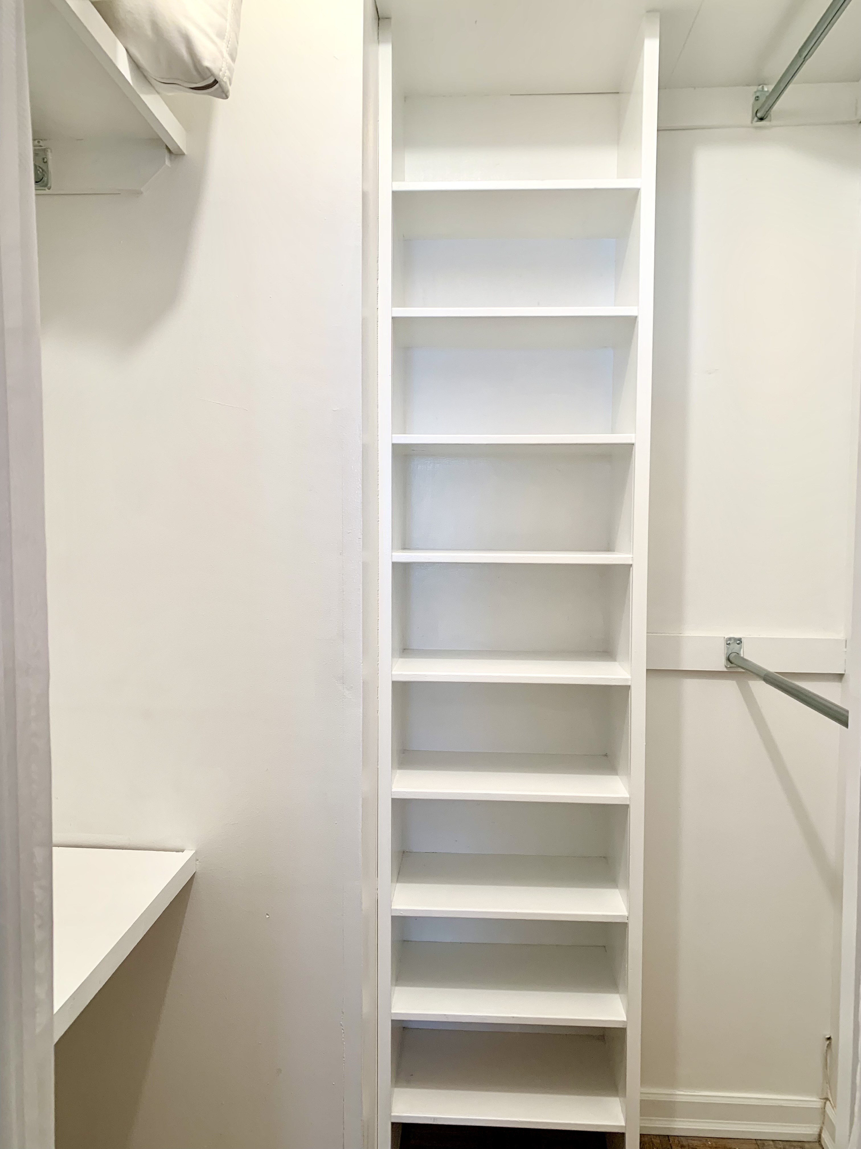 200 Rector Place, Unit 2C Manhattan, NY 10280 - Photo 9 of 19 a view of walk in closet with empty racks