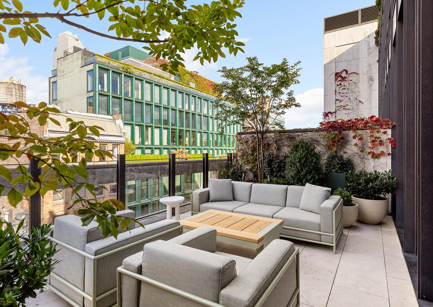 25 Bond Street, Unit PHW Manhattan, NY 10012 - Photo 4 of 34 a view of a patio with couches and potted plants