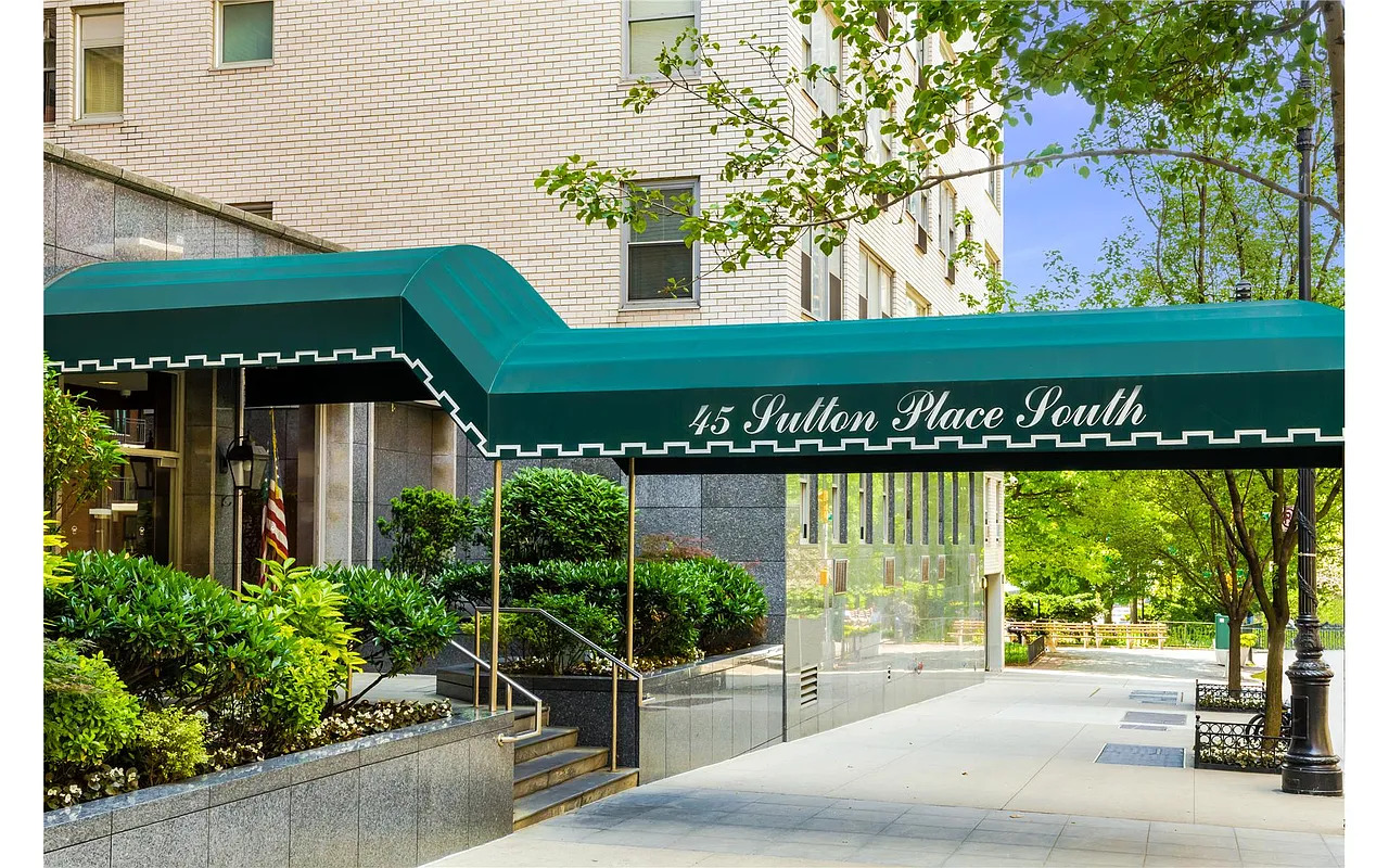 45 Sutton Place South, Unit 14N Manhattan, NY 10022 - Photo 17 of 19 a front view of a house with garden