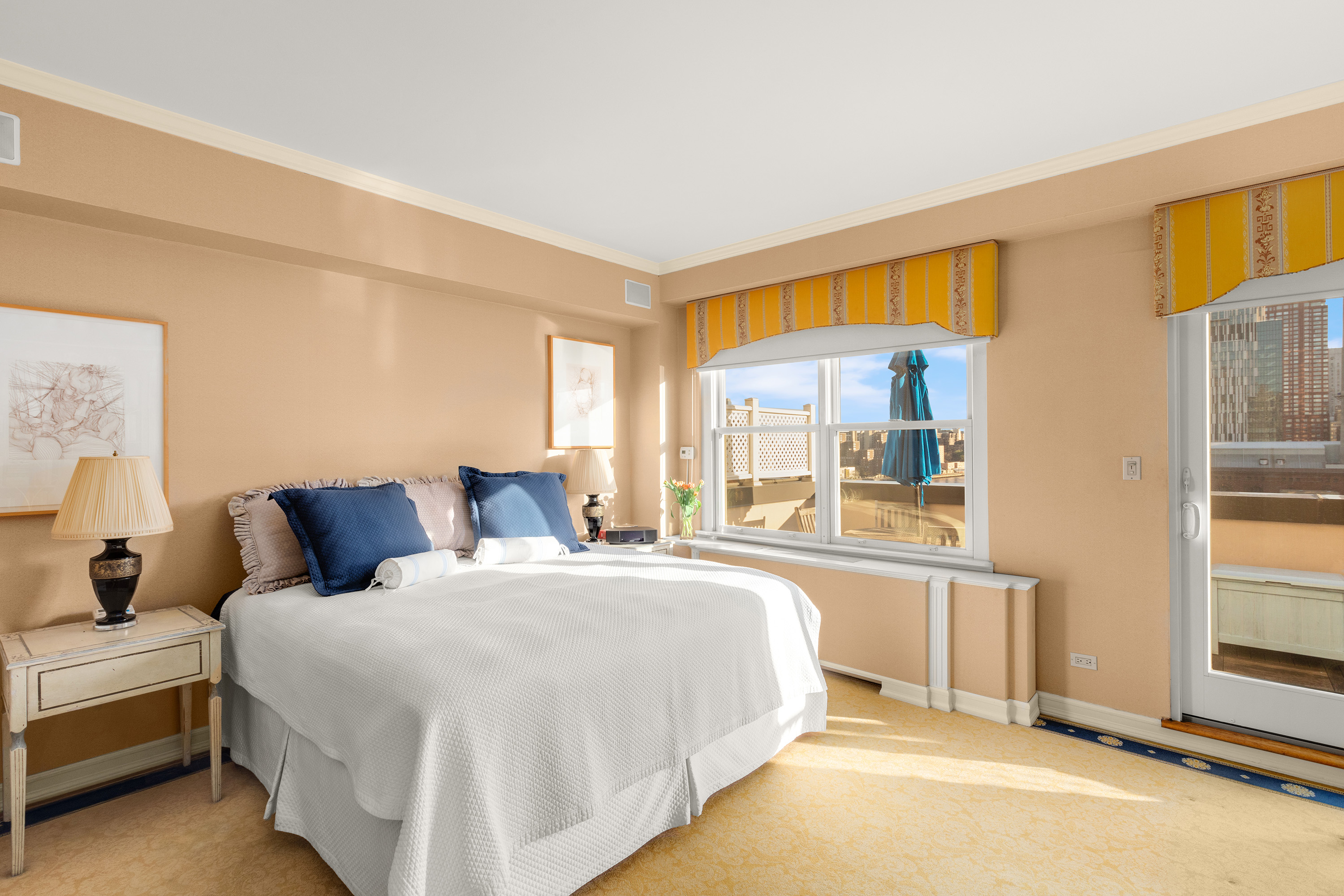 2 East End Avenue, Unit PHG Manhattan, NY 10075 - Photo 8 of 15 a bedroom with a bed and a large window