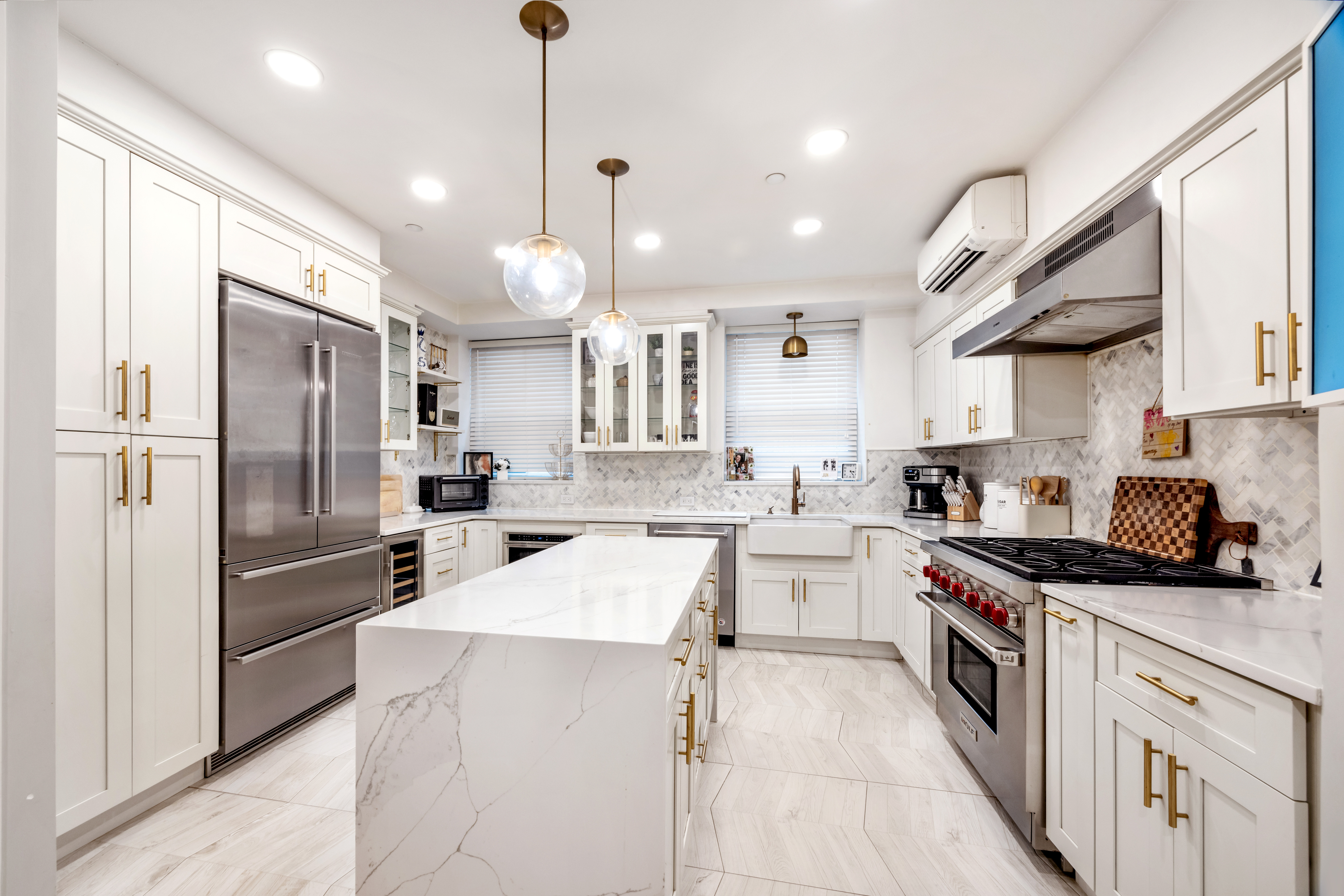 43 Murray Street, Unit Undisclosed Manhattan, NY 10007 - Photo 4 of 12 a kitchen with a sink stainless steel appliances and cabinets